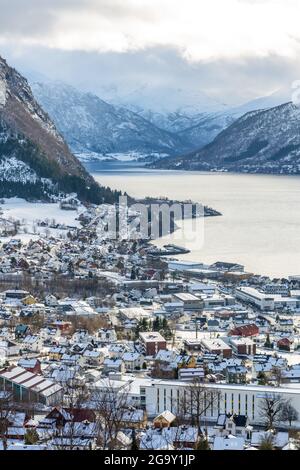 Vertical shot of Volda village and scenic nature during winter in Norway Stock Photo