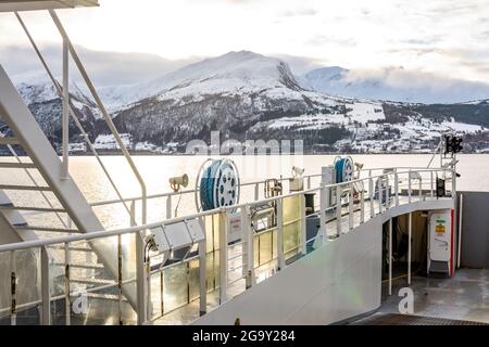 Village of Volda from a boat in Norway during winter Stock Photo