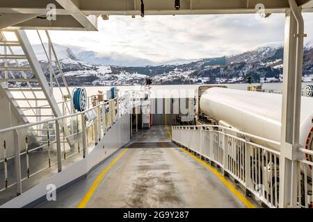 Village of Volda from a boat in Norway during winter Stock Photo