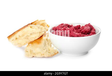 Bowl with tasty beet hummus, bread, crackers and sauces on dark ...