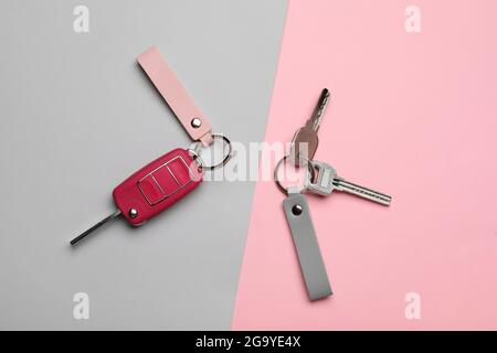 Keys with leather keychains on color background Stock Photo