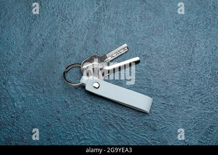 Keys with leather keychain on dark background Stock Photo