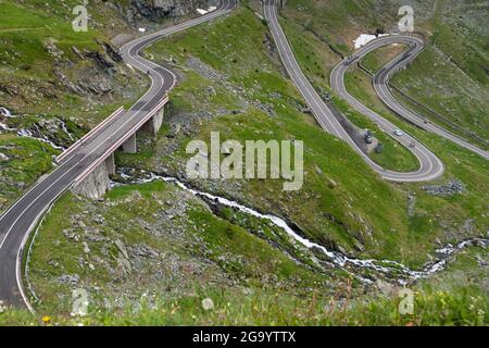 Landscape in Fagaras mountains in Romania, with Transfagarasan road. One of the most spectacular roads in the world