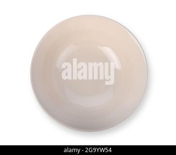 Empty beige ceramic bowl or ramekin isolated on a white background. Top view Stock Photo