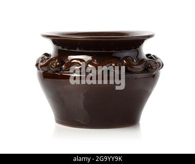 Brown Ceramic jug. Isolated on white background. Stock Photo