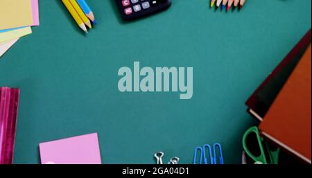 Graduation hat and diploma icon against various school items Stock Photo