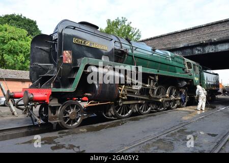 A class 9F smouldering at Loughborough station. Stock Photo