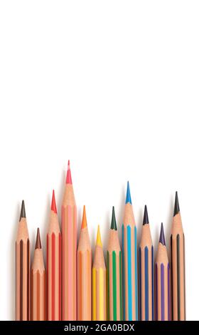 Color pencils isolated on a white background. Multicolored crayons. Vertical banner. Copy space. Stock Photo