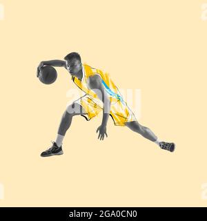 Zine collage. Young man, basketball player in drawn sports uniform isolated on light background. Illustration, painting. Concept of sport, game Stock Photo