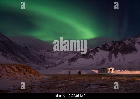 the northern lights illuminate the Icelandic winter sky Stock Photo