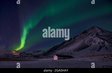 the northern lights illuminate the Icelandic winter sky Stock Photo