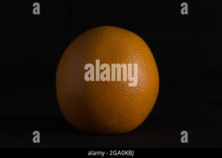 red grapefruit on black background Stock Photo