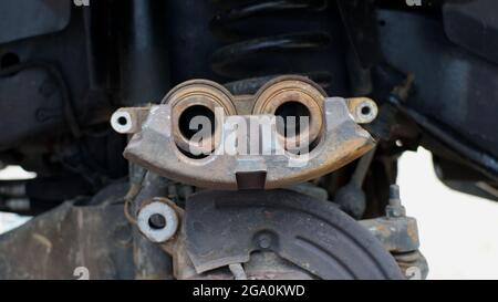 A Close Up of Front Disc Brake Service on a Vehicle Stock Photo