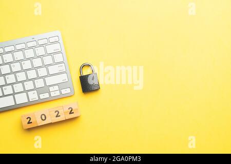 Internet cybersecurity concept with lock and keyboard in 2022 with copy space. Stock Photo