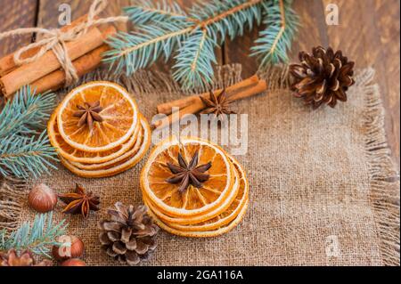 Christmas, New Year holiday cooking background. Ingredients, spices, dried  oranges and baking molds, Christmas decorations (balls, fir-tree branch, co  Stock Photo - Alamy