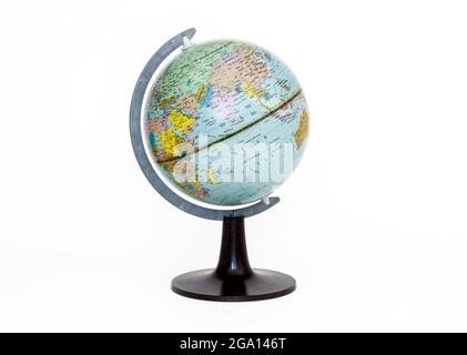 A small geographical globe isolated isolated on a white background, with clipping path Stock Photo