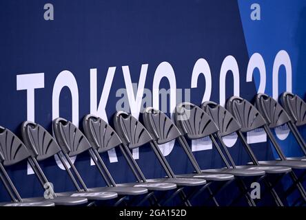 Tokio, Japan. 28th July, 2021. Gymnastics: Olympics, all-around, men, final at Ariake Gymnastics Centre. Chairs stand in front of the lettering 'Tokyo 2020'. Credit: Marijan Murat/dpa/Alamy Live News Stock Photo