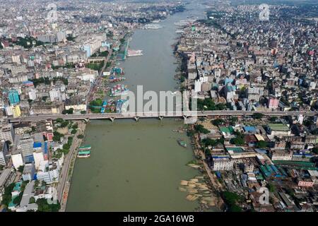 Dhaka, Bangladesh - July 25, 2021: A Bird's-eye View of the Buriganga River. Every year during the monsoon season, the water of the river Buriganga in Stock Photo