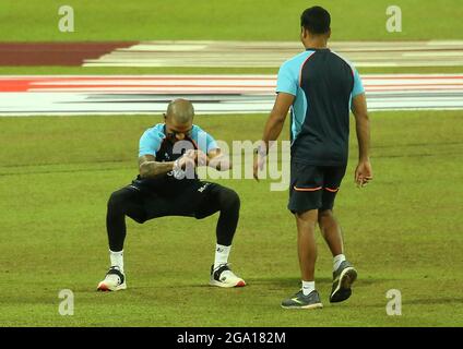 Colombo, Si Lanka. 28th July, 2021. India's captain Shikhar Dhawan (L) practices before the start of the Second T20 match between India and Sri Lanka at the R.Premadasa Stadium in Colombo on July 28, 2021. (Credit Image: © Pradeep Dambarage/ZUMA Press Wire) Stock Photo