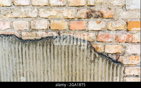 texture of an old brick wall with gray grout Stock Photo