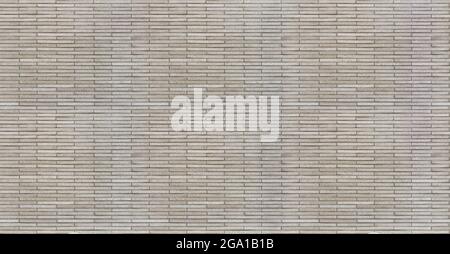 Wall made of thin artificial stone bricks, seamless texture pattern Stock Photo