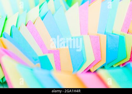 Abstract colorful origami background, parametric structures of linked paper sheets, close up photo with selective soft focus Stock Photo