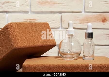 Empty jars for spa salon on the decorated makeup desk. Fashion and beauty backgrounds and symbols for advertisement Stock Photo