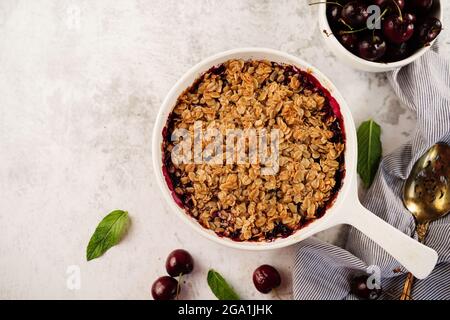 Cherry crisp - cherries oats bake Stock Photo