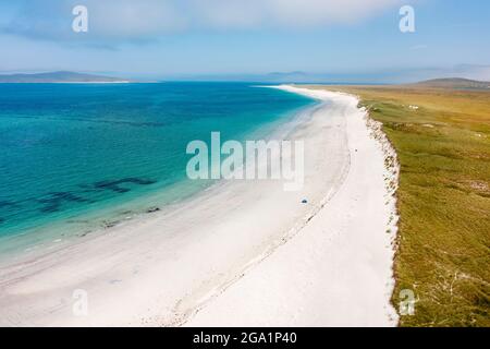 Aerial view from drone of white sand beach on west coast of island of Berneray in the Outer Hebrides, Scotland, UK Stock Photo