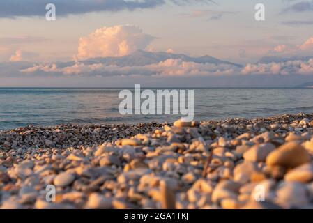 A pebble beach in Acharavi in the northern part of the island of Corfu. Greece Stock Photo