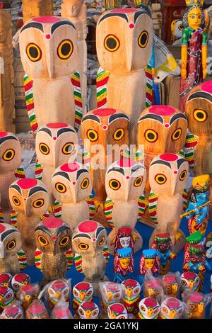 Wooden owls, artworks of handicraft, on display during Handicraft Fair in Kolkata - the biggest handicrafts fair in Asia. Stock Photo