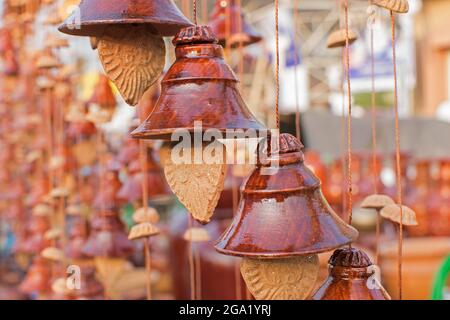 Designer bells made of clay, handicrafts on display during the Handicraft Fair in Kolkata , earlier Calcutta, West Bengal, India. It is the biggest ha Stock Photo