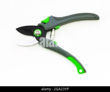 Open new professional secateur or garden pruner close up isolated on white background. Top view Stock Photo