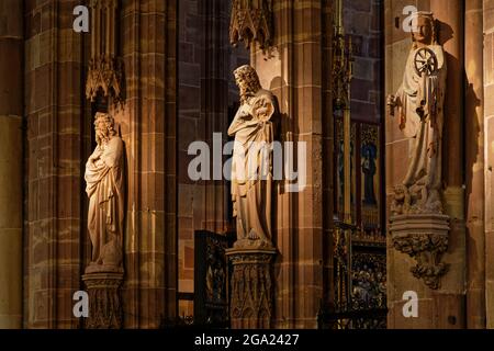 STRASBOURG, FRANCE, June 23, 2021 : Some statues inside the nave of Strasbourg Cathedral