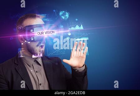Businessman looking through Virtual Reality glasses Stock Photo