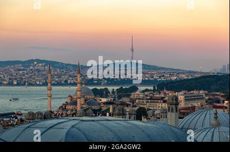 Sunset view of the Golden Horn, the Bosporus, downtown Istanbul and Galata Tower seen from Suleymaniye Mosque. Stock Photo