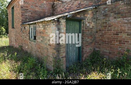 Old brick farm building ready for renovation Stock Photo