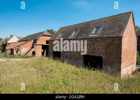 Old brick farm building ready for renovation Stock Photo