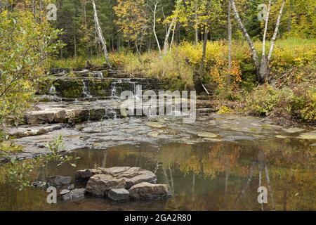 Reflections in autumn; Thunder Bay, Ontario, Canada Stock Photo