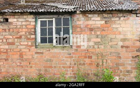 Old brick farm building ready for renovation Stock Photo