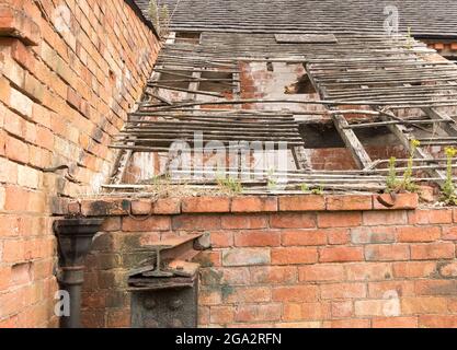 Old brick farm building ready for renovation Stock Photo