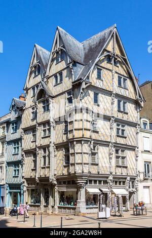 Ancient 15th century half-timbered building 'La Maison des Artisans' or 'La Maison d'Adam' in Place Sainte-Croix, Angers, Maine-et-Loire (49), France. Stock Photo