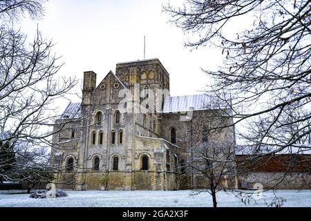 Hospital of St Cross and Almshouse of Noble Poverty, defined by early morning snow; Winchester, Hampshire, England Stock Photo