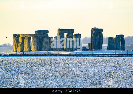 Stonehenge defined by early morning snow; Wiltshire, England, United Kingdom Stock Photo