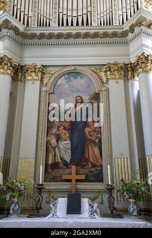 Interior of the Viscri Fortified Saxon Church, showing the altar with a religious painting, The Blessing of the Children by J. Paukratz added in th... Stock Photo