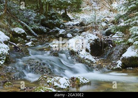 Snowy waterfall, Janosikove Diery in Mala Fatra National Park; Terchova, Slovakia Stock Photo