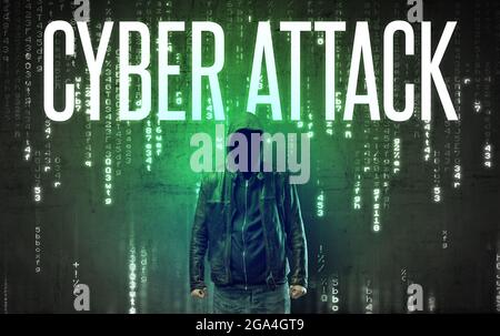 Faceless hacker with inscription Stock Photo