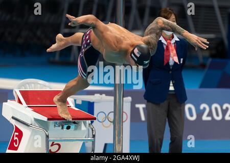 TOKYO, JAPAN - JULY 29: Caeleb Dressel of United States shows the gold ...