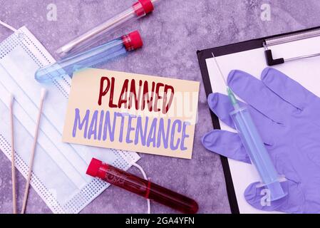 Writing displaying text Planned Maintenance. Concept meaning reventive maintenance carried out base on a fixed plan Researching Preventive Medications Stock Photo