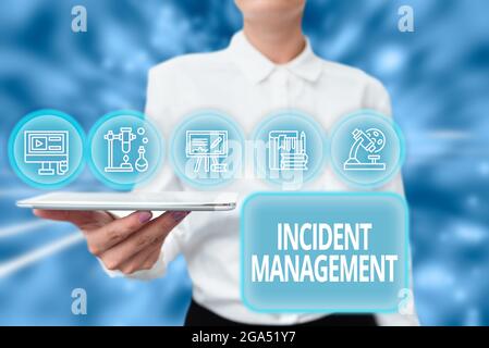 Inspiration showing sign Incident Management. Business concept Activities of a company to identify and correct hazards Lady Uniform Standing Tablet Stock Photo